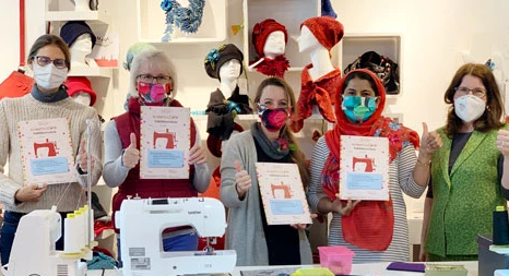 Von 0 auf 100 … von der Mode- zu Masken-Machern