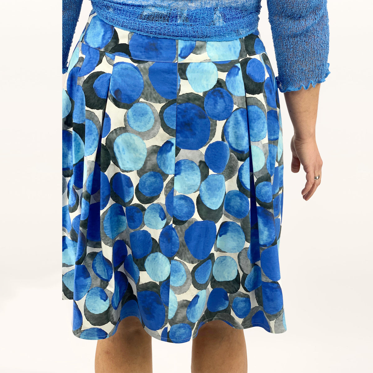 Faltenrock Tina blau Rückansicht